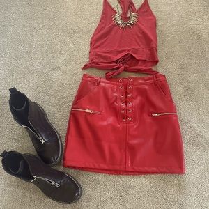 Red lace-up faux leather mini skirt